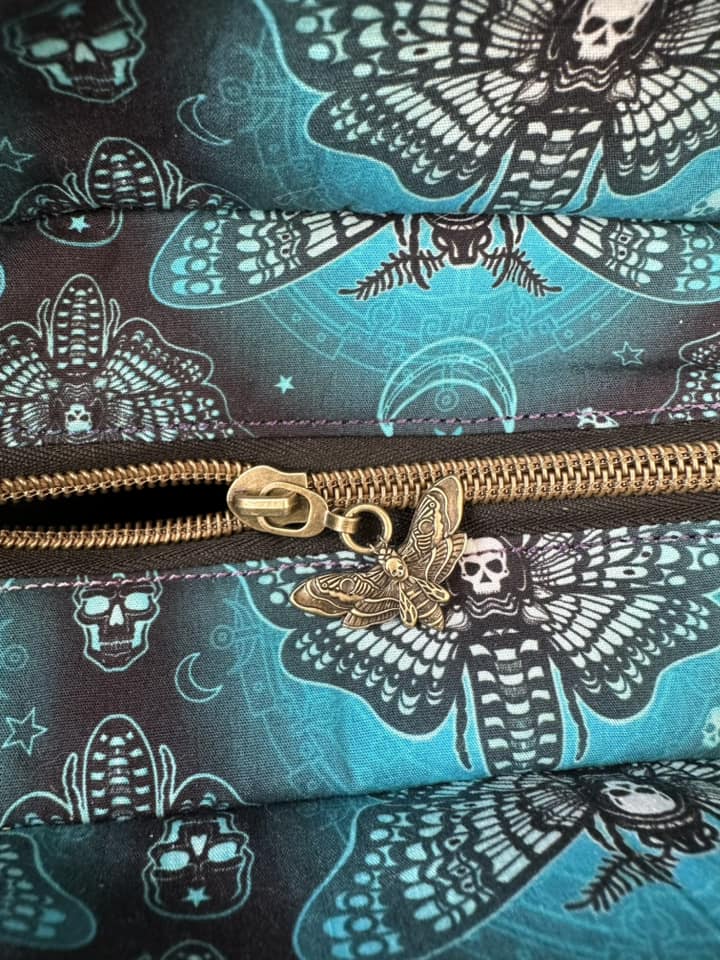 Double-sided Death Moth Zipper Pulls. Available in 4 finishes