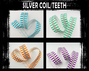 White Striped Zipper Tape, Size 5 Nylon Coil with silver teeth. Blue, Green, Orange & Purple stripes